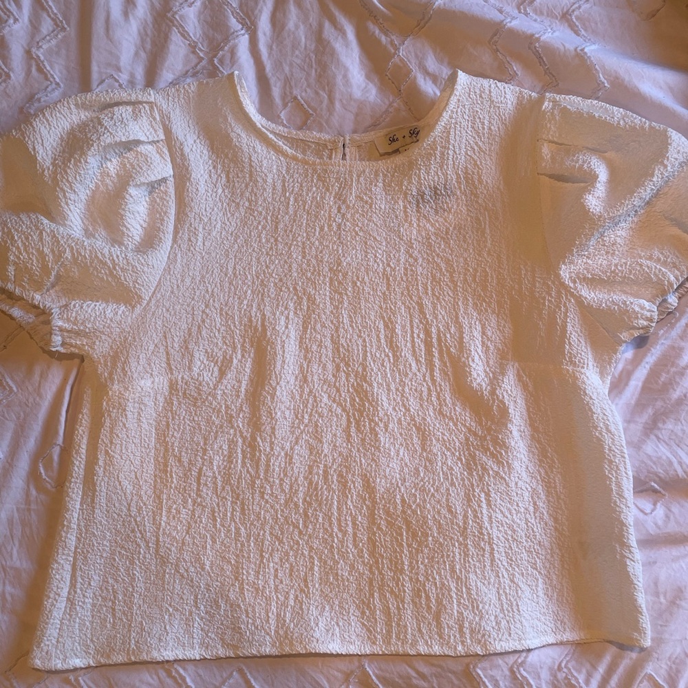 white top with puffed sleeves